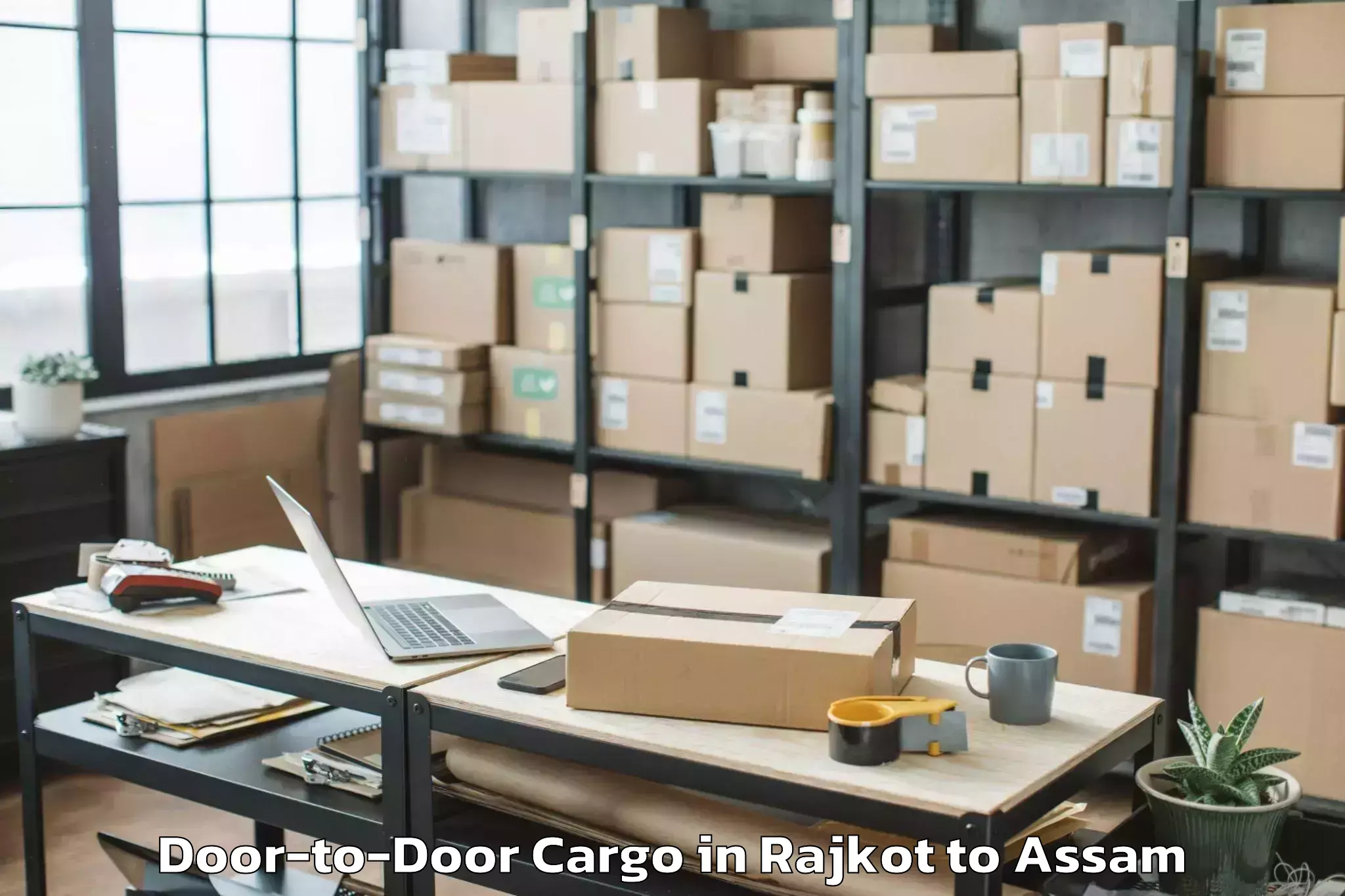 Easy Rajkot to Jagiroad Door To Door Cargo Booking